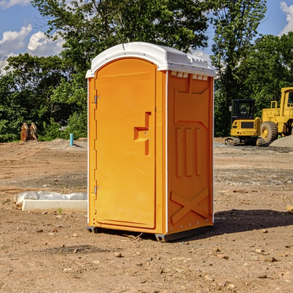 how often are the portable restrooms cleaned and serviced during a rental period in Harlan OH